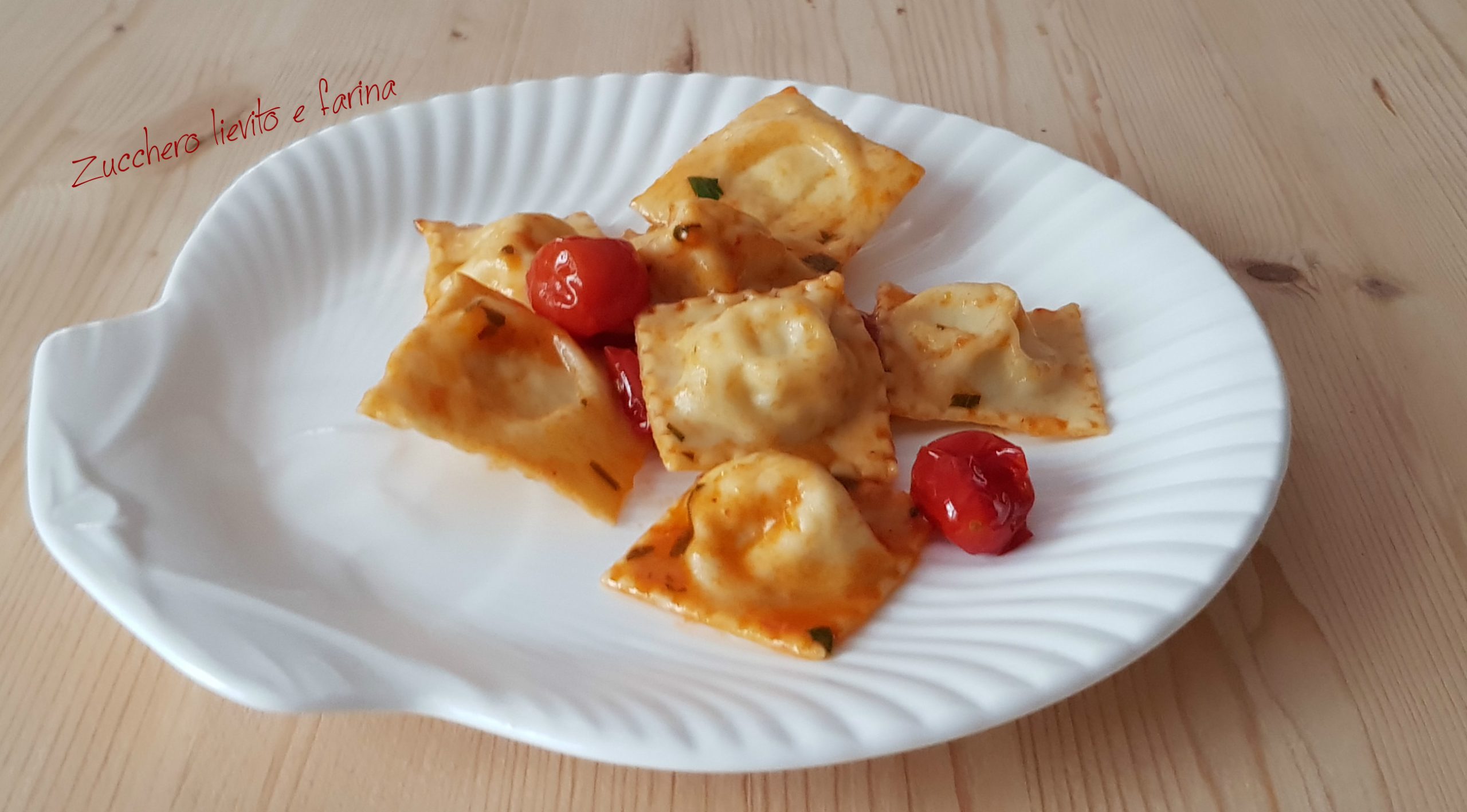 Ravioli di branzino con sugo di  pomodorini
