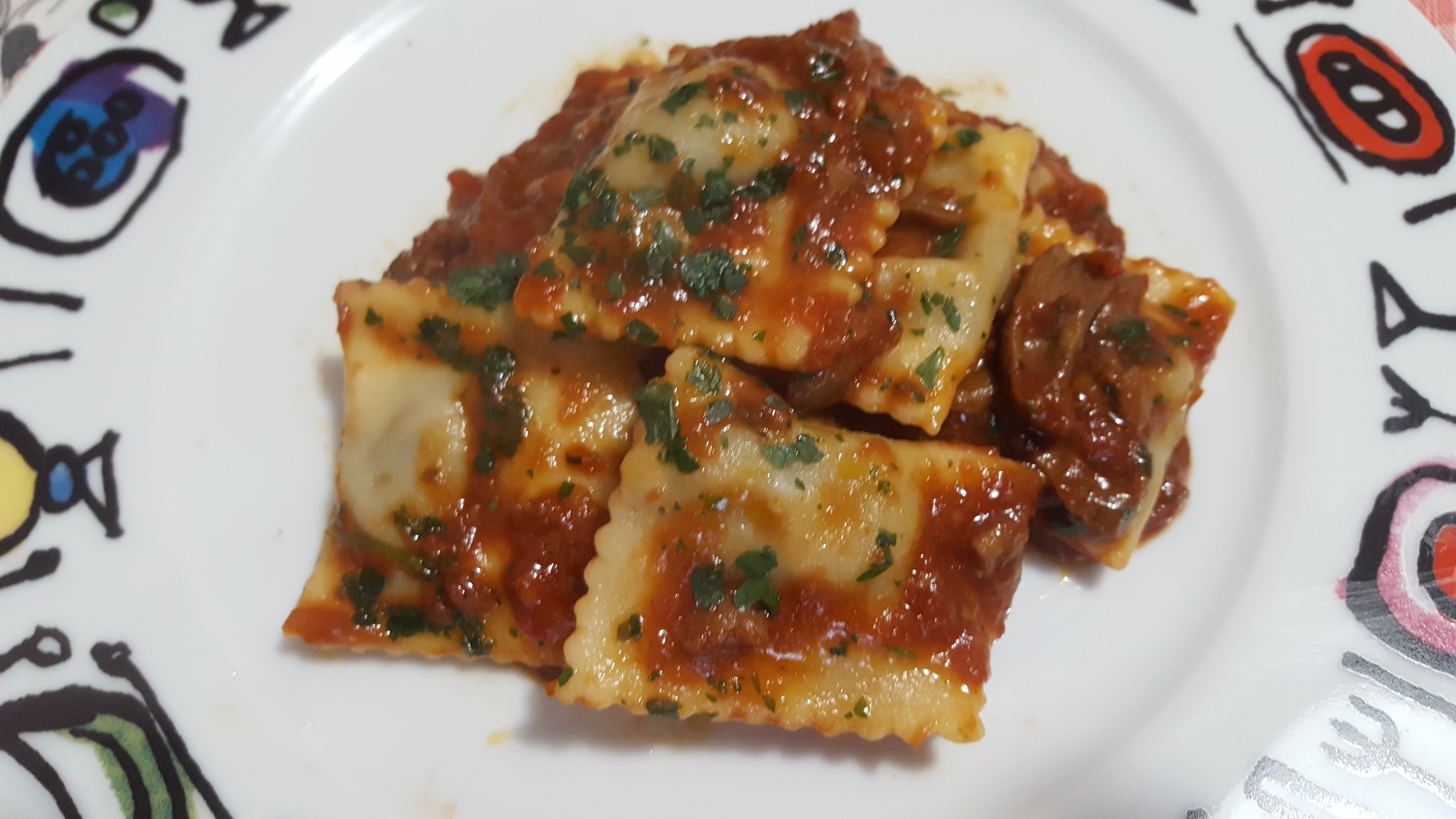 Ravioli di carne al sugo di funghi