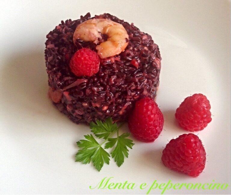 Ricetta riso venere con gamberi e lamponi