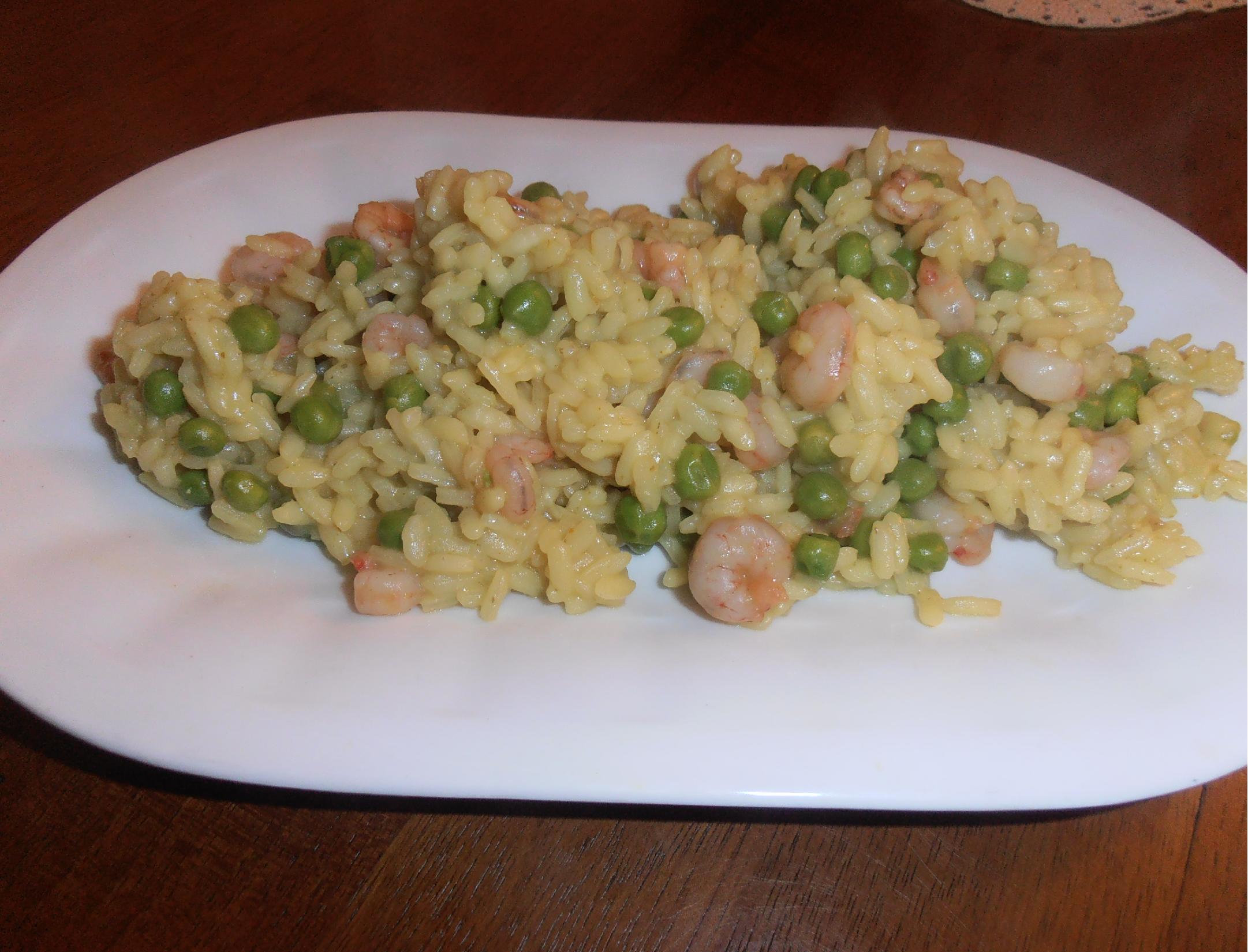 Riso al curry,piselli e gamberetti