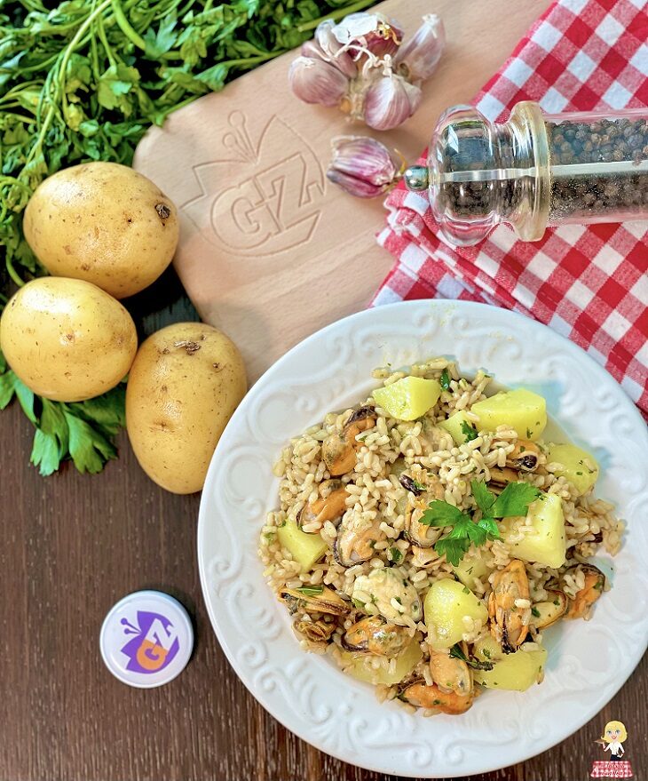 Riso con patate e cozze in padella