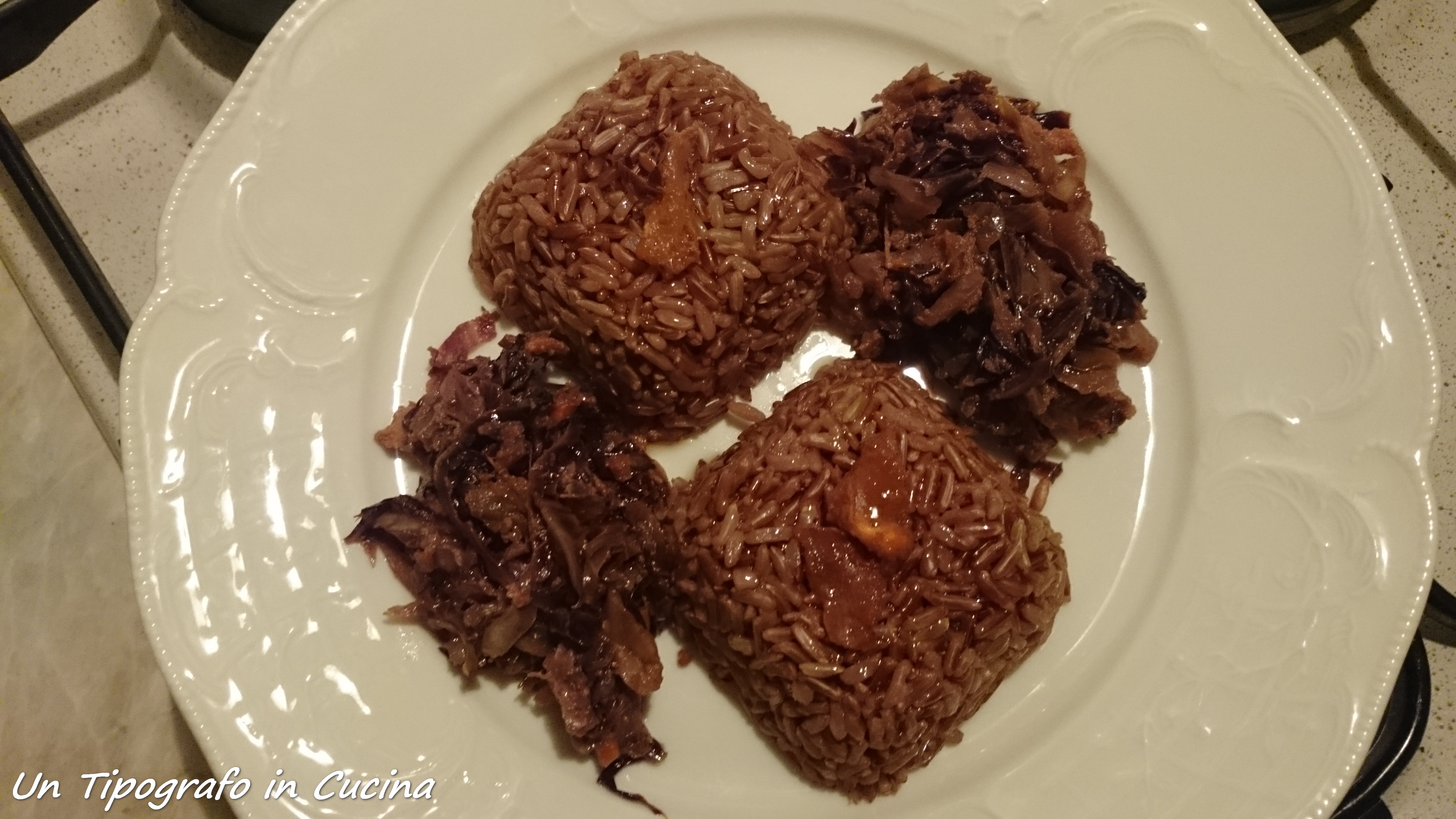 Riso ermes con pasticcio di radicchio e cachi sfumato con marsala dolce…