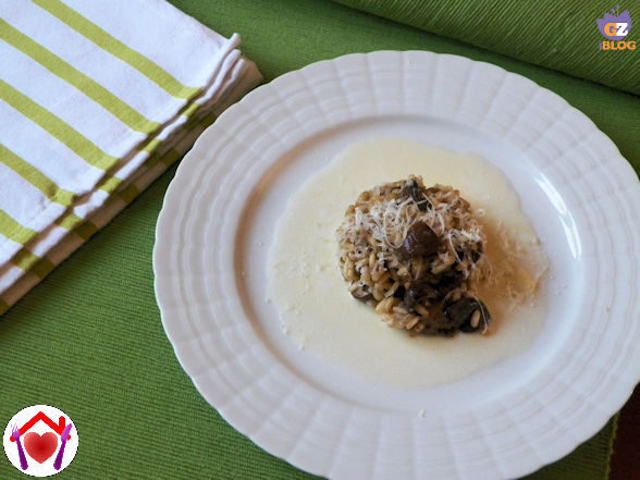 Risotto ai funghi su fonduta di asiago