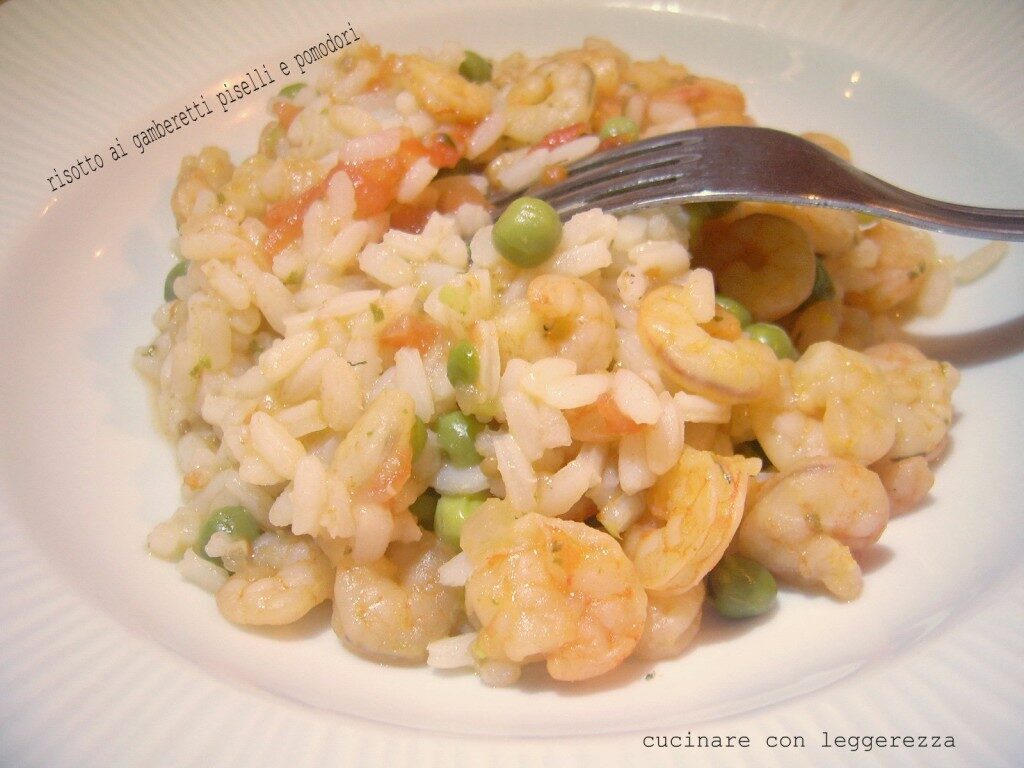 Risotto ai gamberetti piselli e pomodori