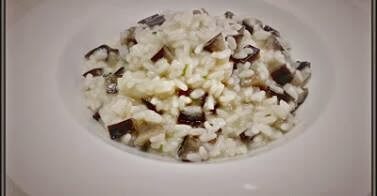 Risotto al parmigiano con melanzana al basilico