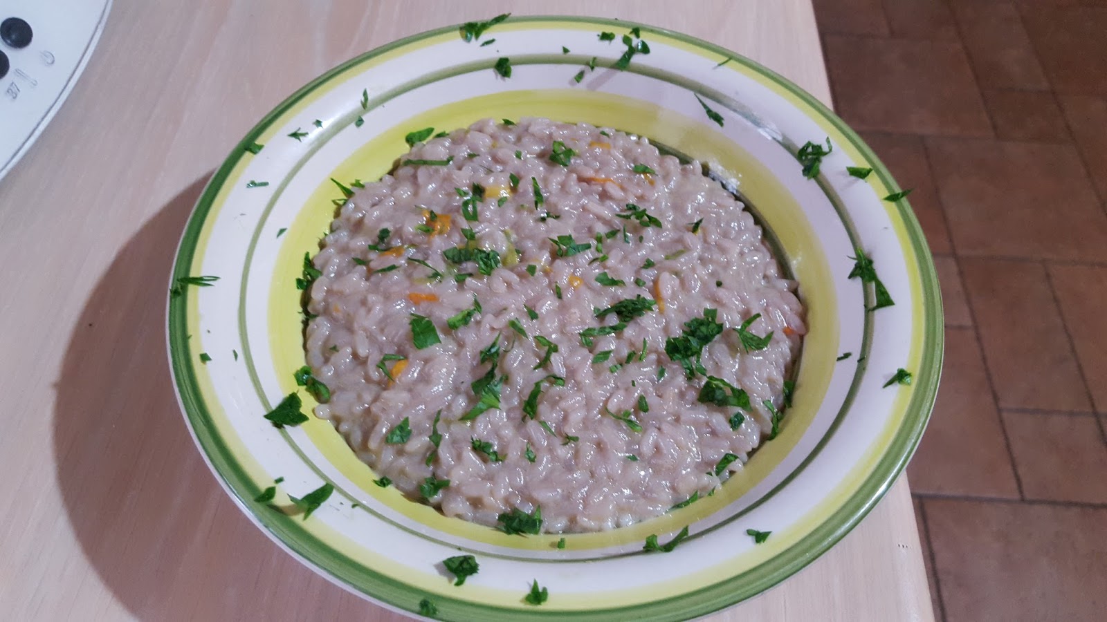 Risotto al primitivo di manduria e fiori di zucca