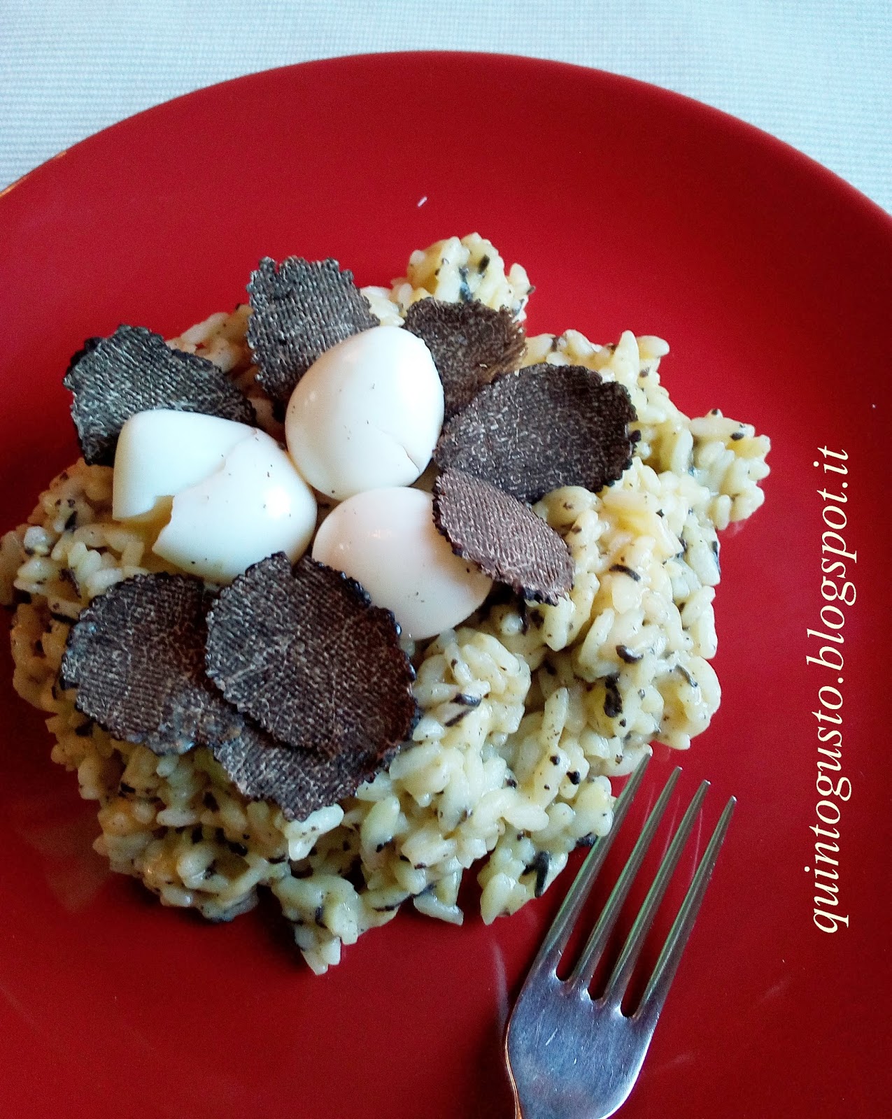 Risotto al tartufo con uova di quaglie