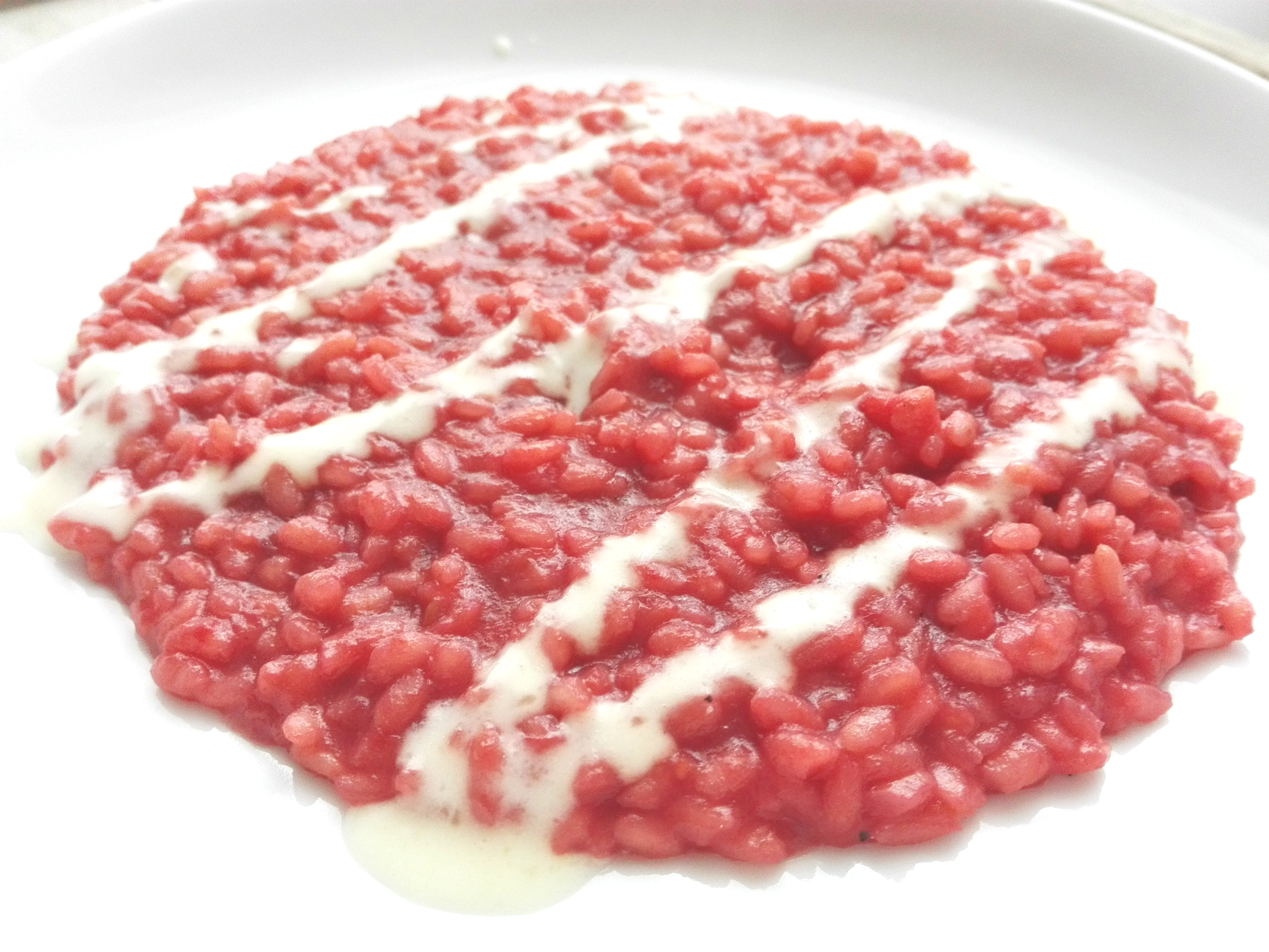 Risotto alla barbabietola e fonduta di Parmigiano