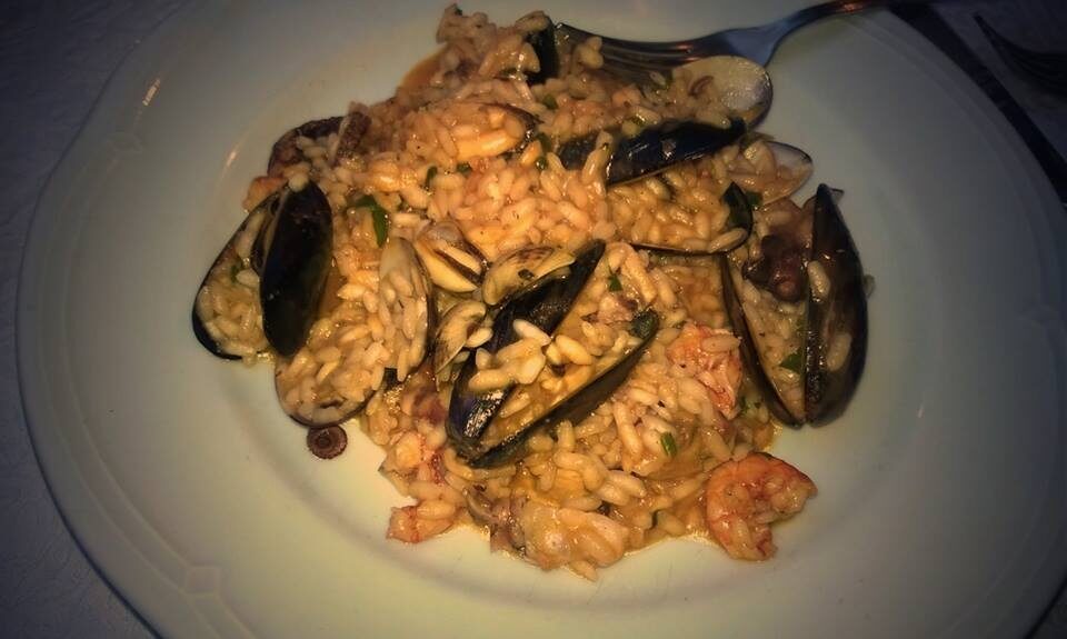 Risotto alla pescatora, profumo d’estate in tavola
