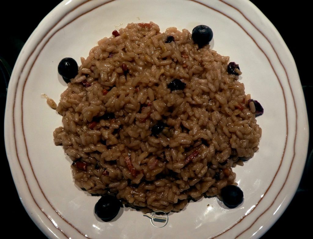 Risotto all’uva e speck