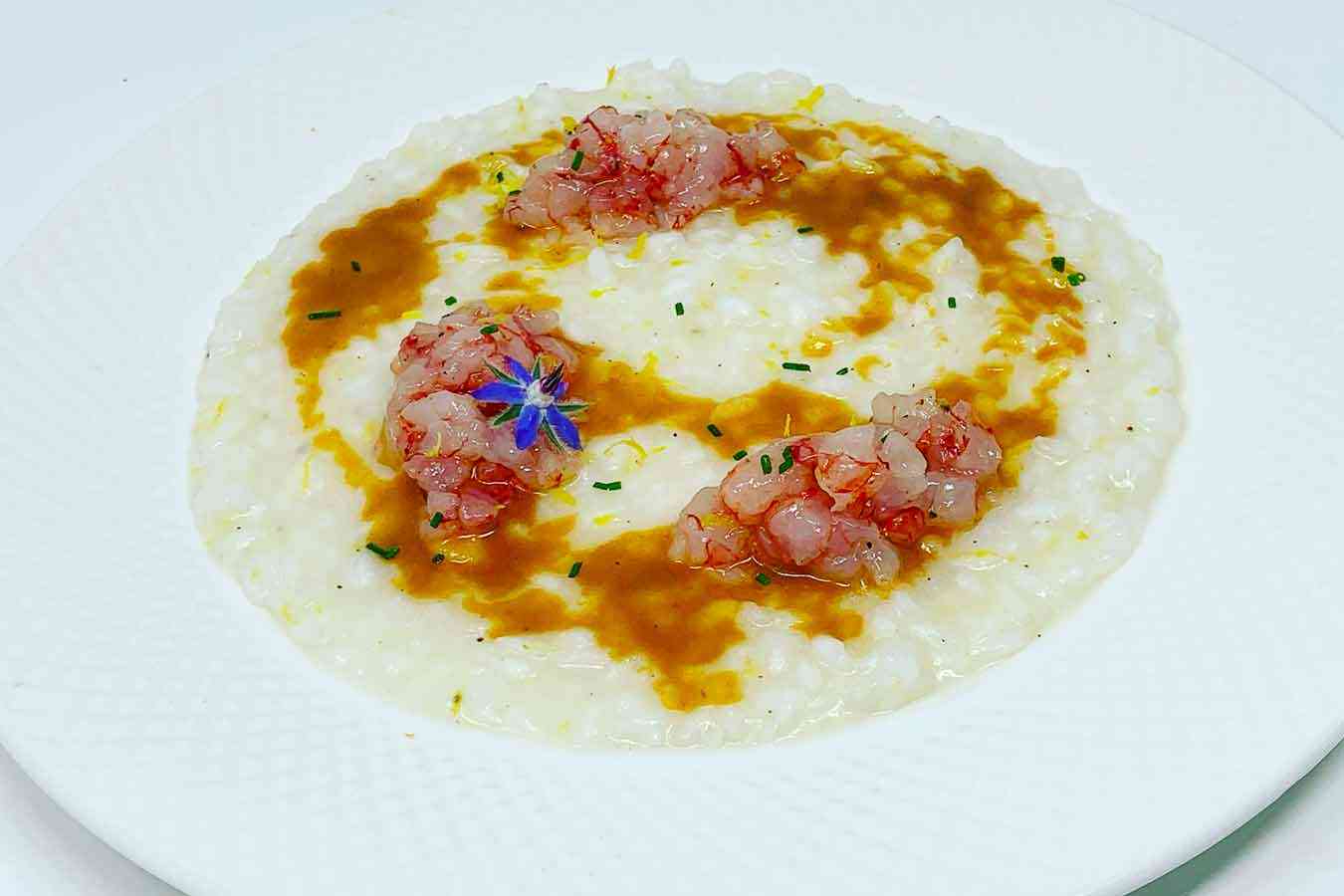 Risotto con bisque, gamberi e limone