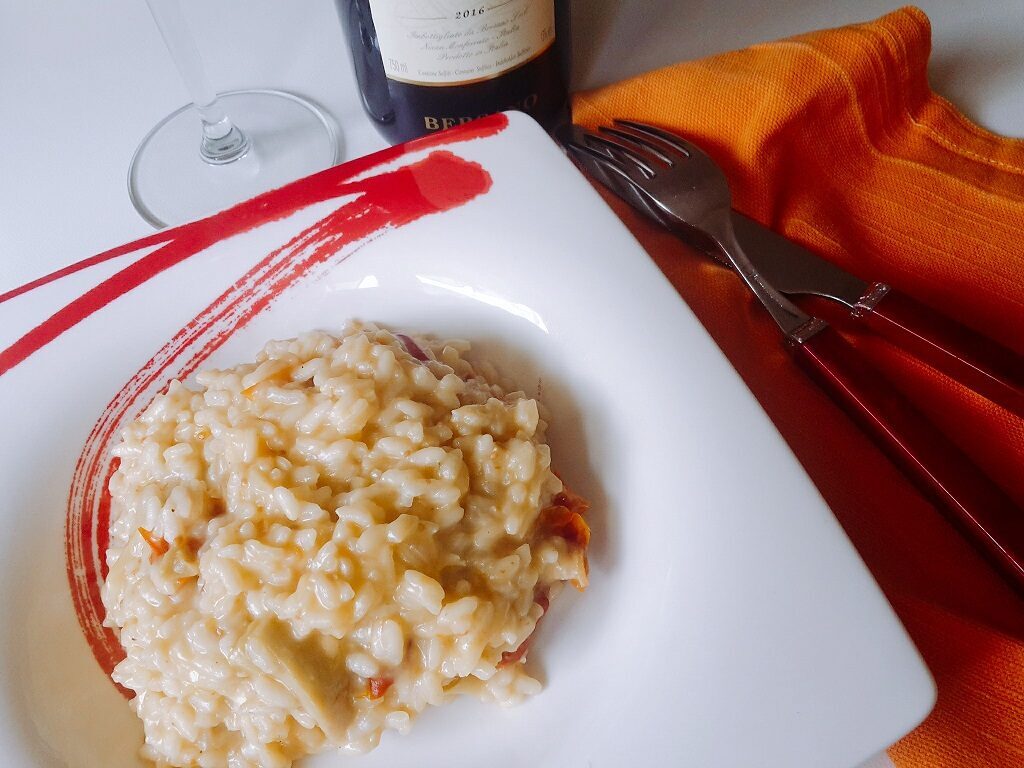 Risotto con carciofini e pomodori secchi mantecato al gorgonzola