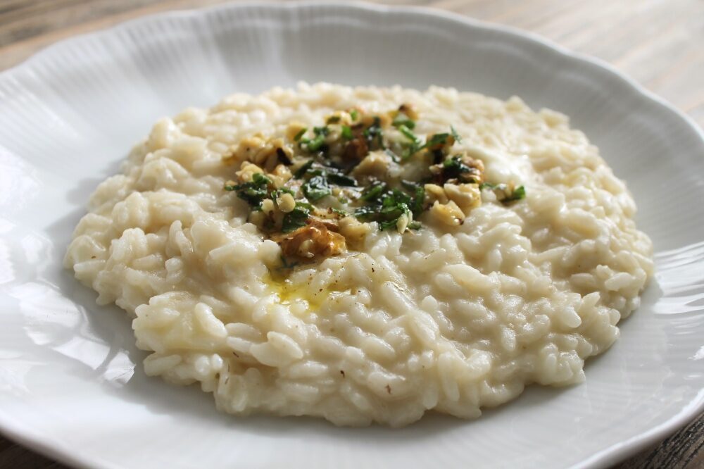 Risotto con crema di patate al morlacco del grappa e noci