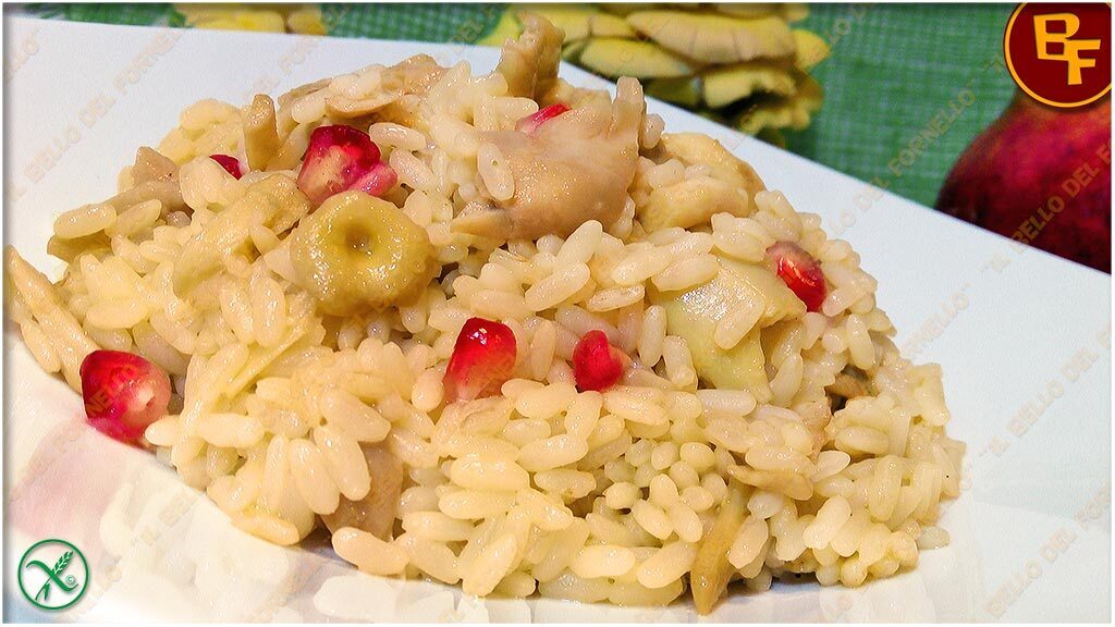 Risotto con funghi crema e melagrana