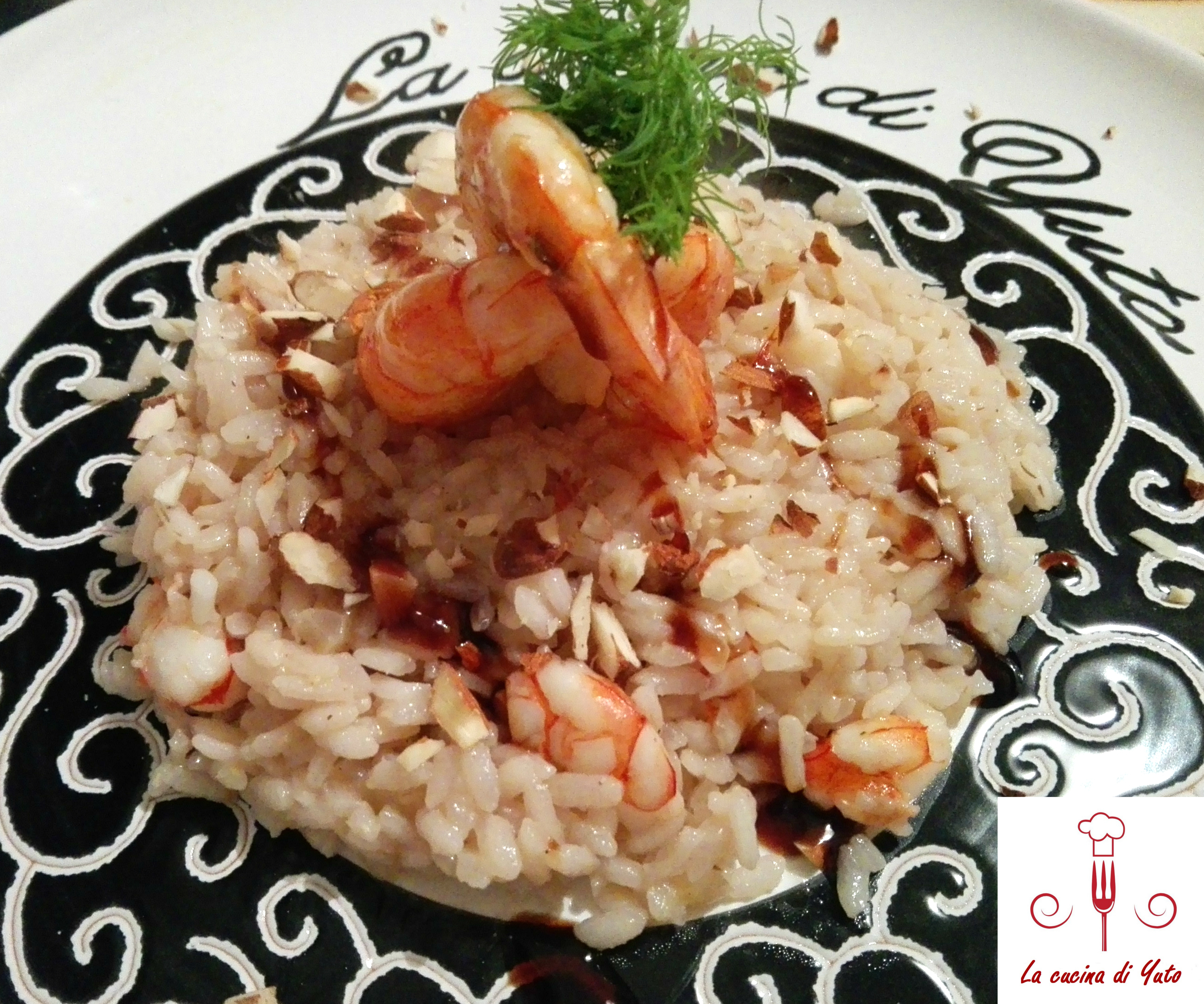 Risotto con gamberoni e mandorle tritate