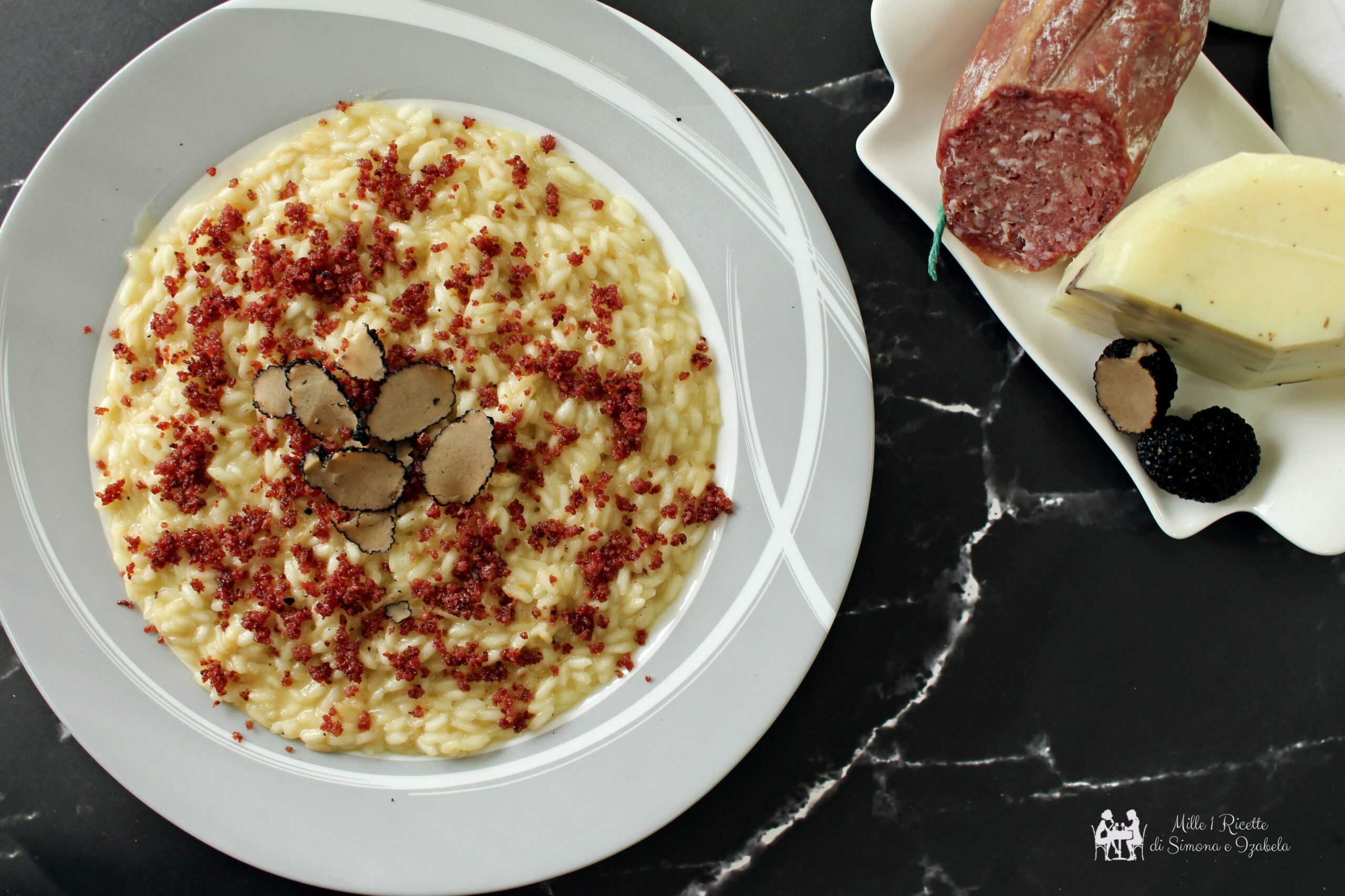 Risotto con pecorino al tartufo e granella di salame al cinghiale