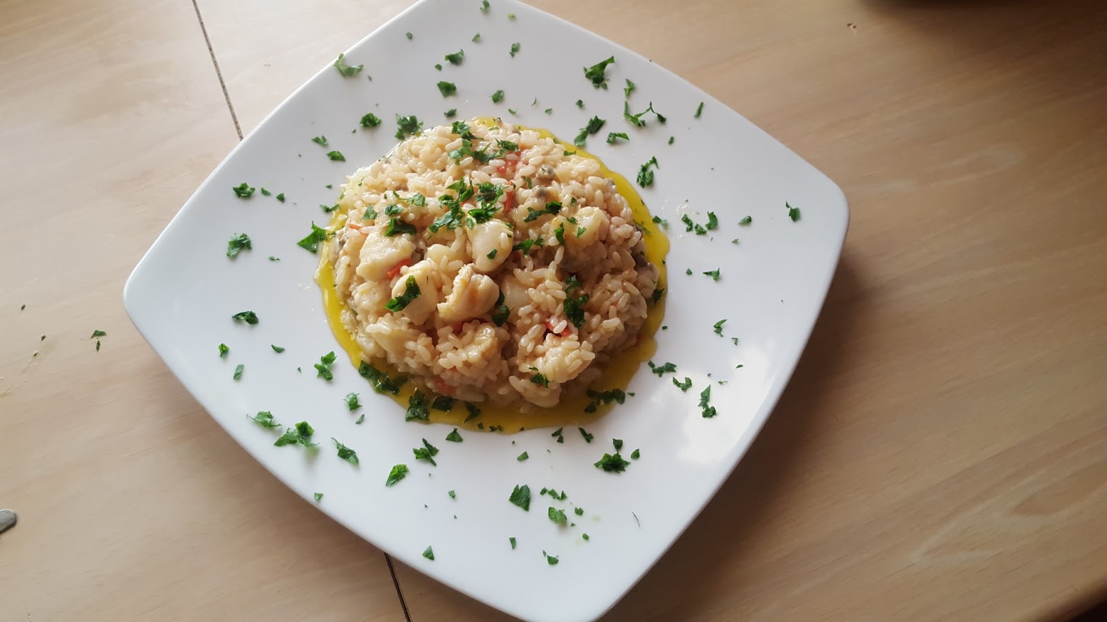 Risotto con pescatrice, vongole e topinambur sfumato al fiano di avellino d.o.c.g.