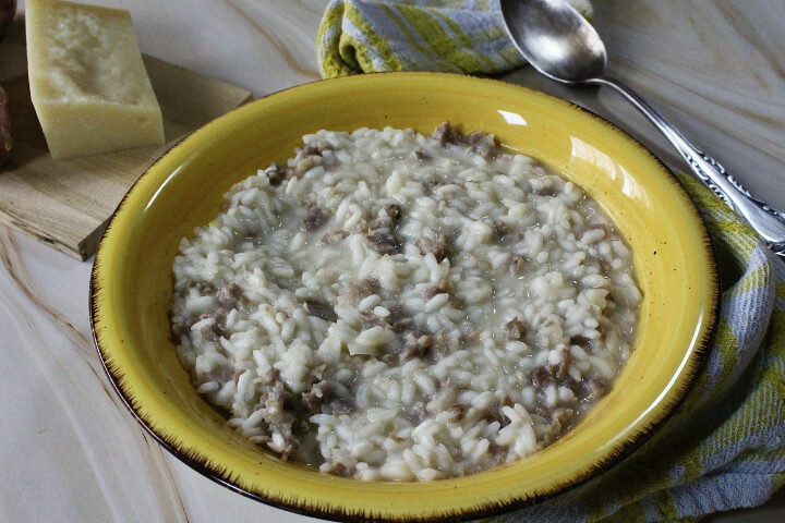 Risotto con salsiccia e crema di parmigiano