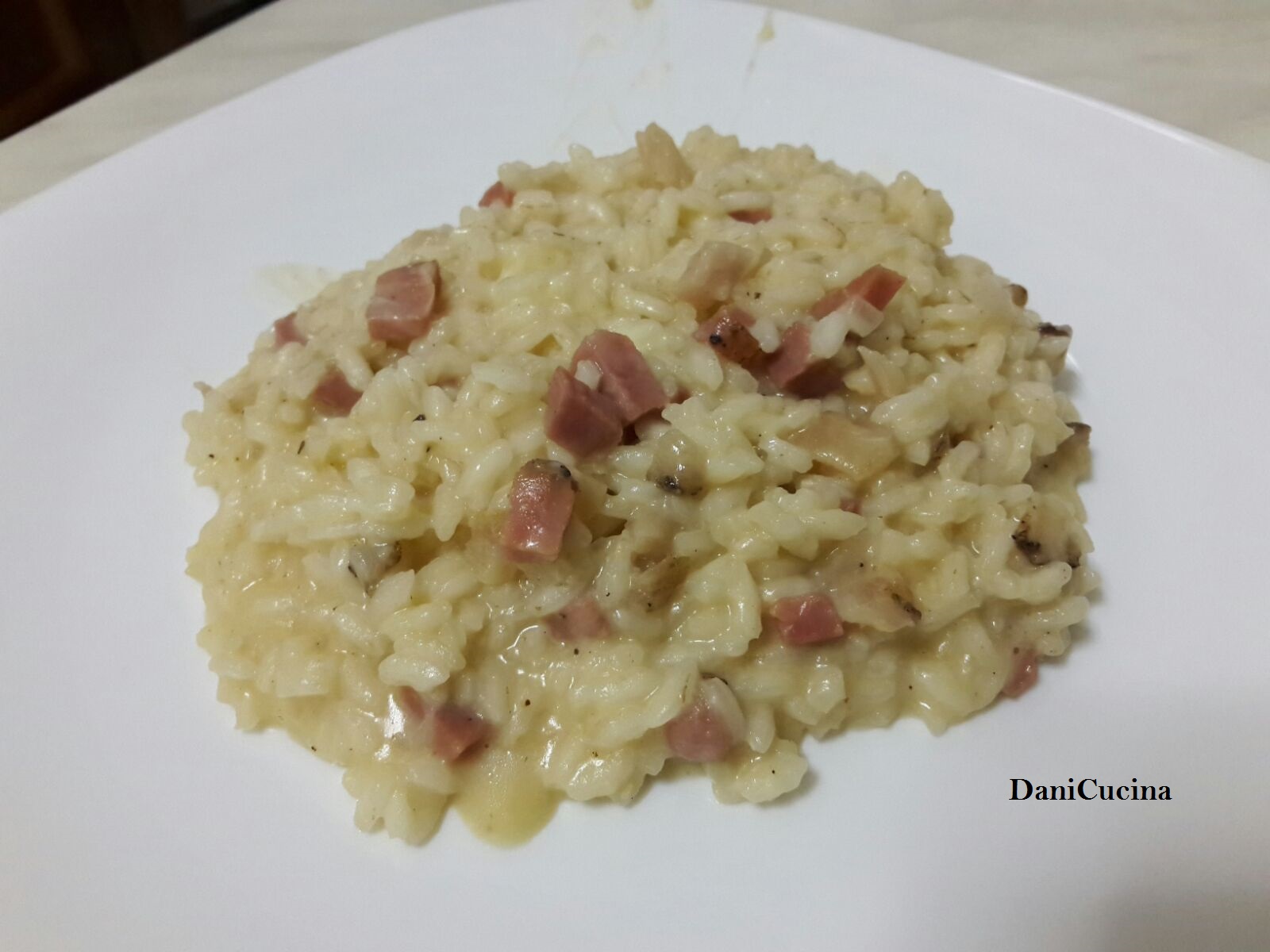 Risotto cremoso speck e provola