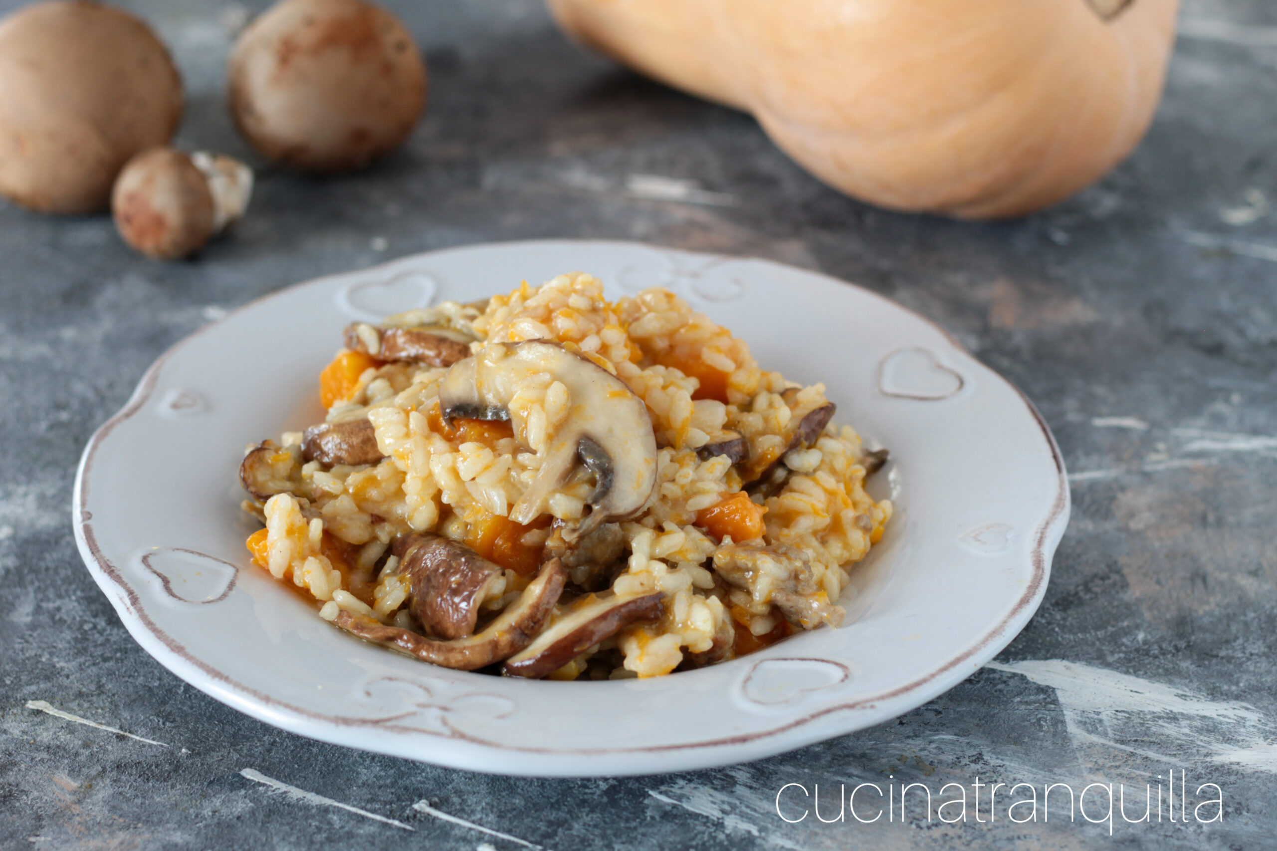 Risotto zucca e salsiccia con funghi