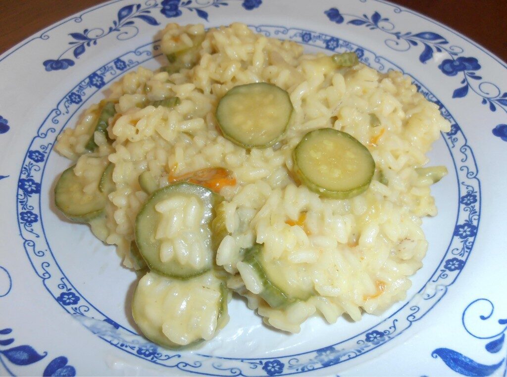 Risotto zucchine e fiori con zafferano e stracchino