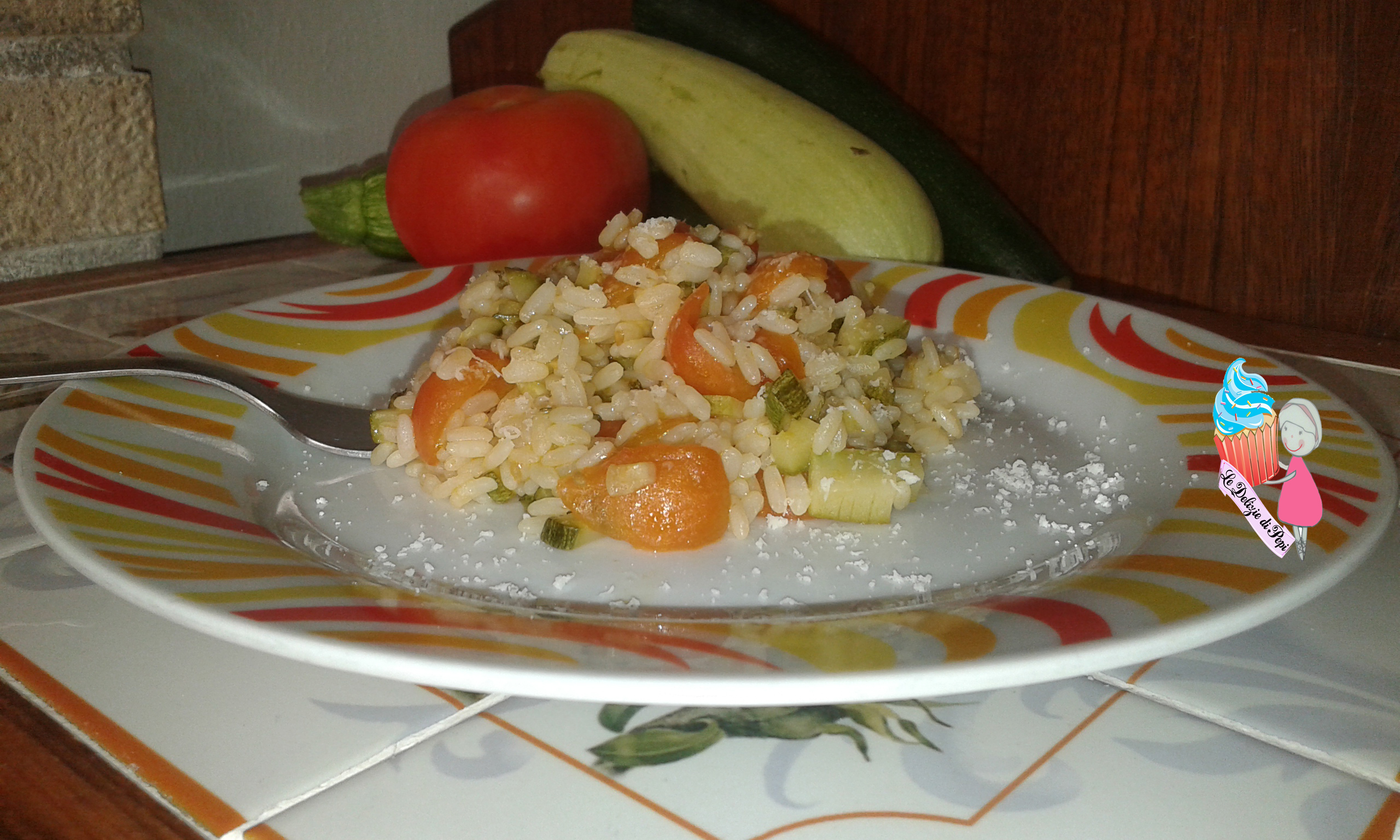 Risotto zucchine e pomodorini