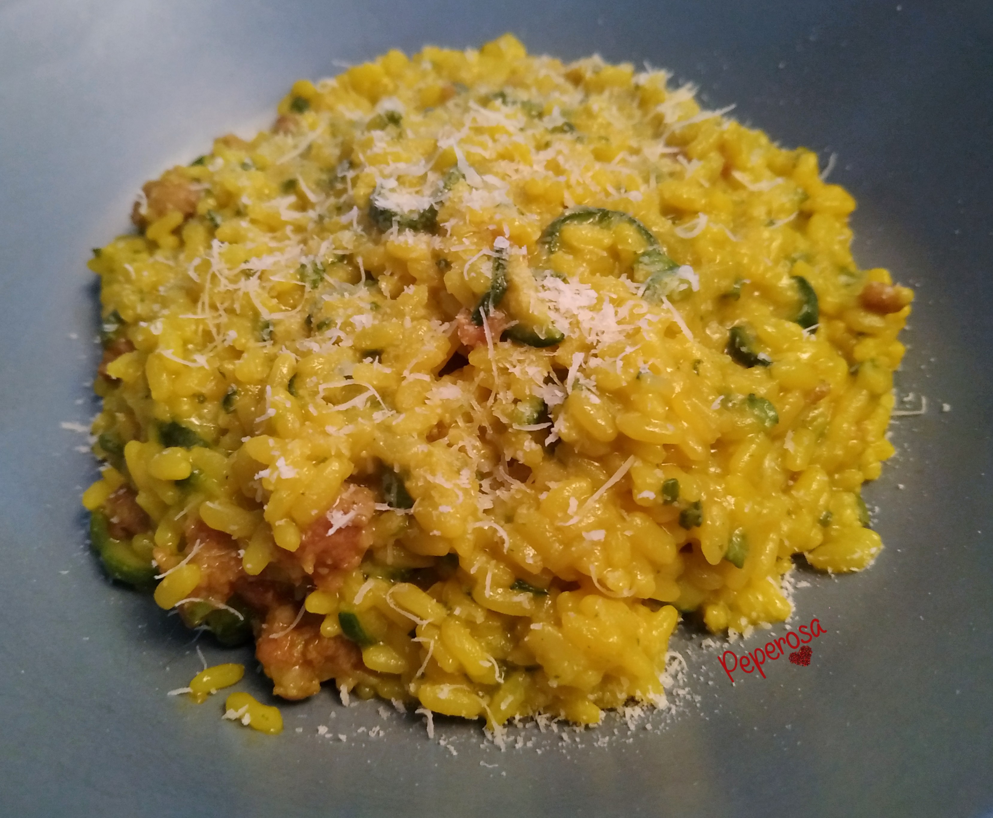 Risotto zucchine, salsiccia e zafferano