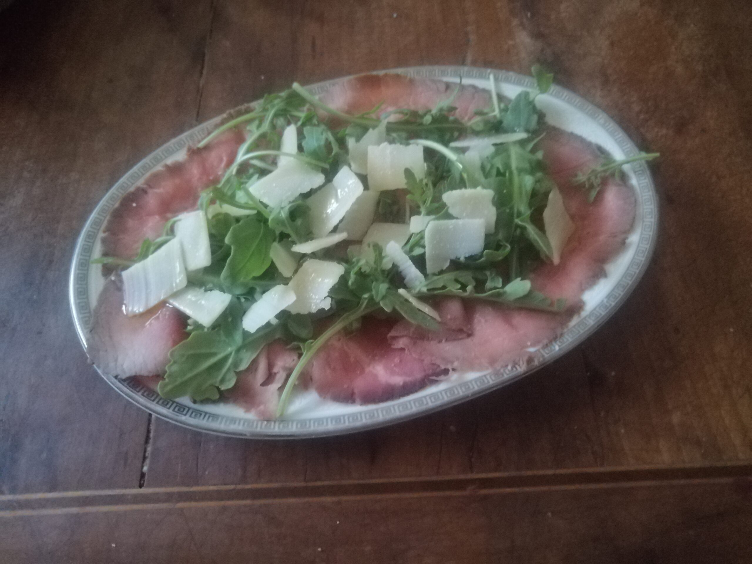 Roast beef con rucola e grana