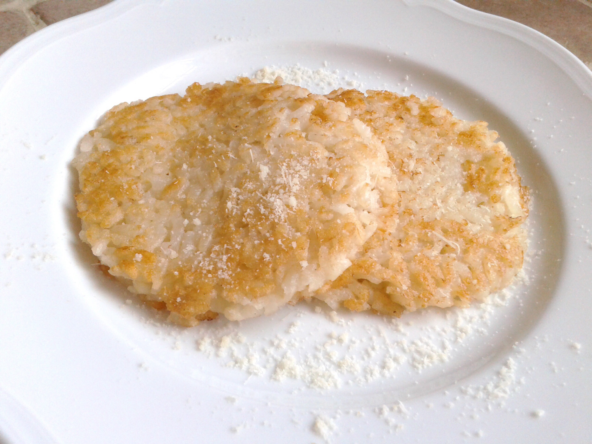 Rosti di riso al parmigiano reggiano