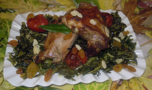 Rosticciana al forno, con contorno di cicoria e uvetta