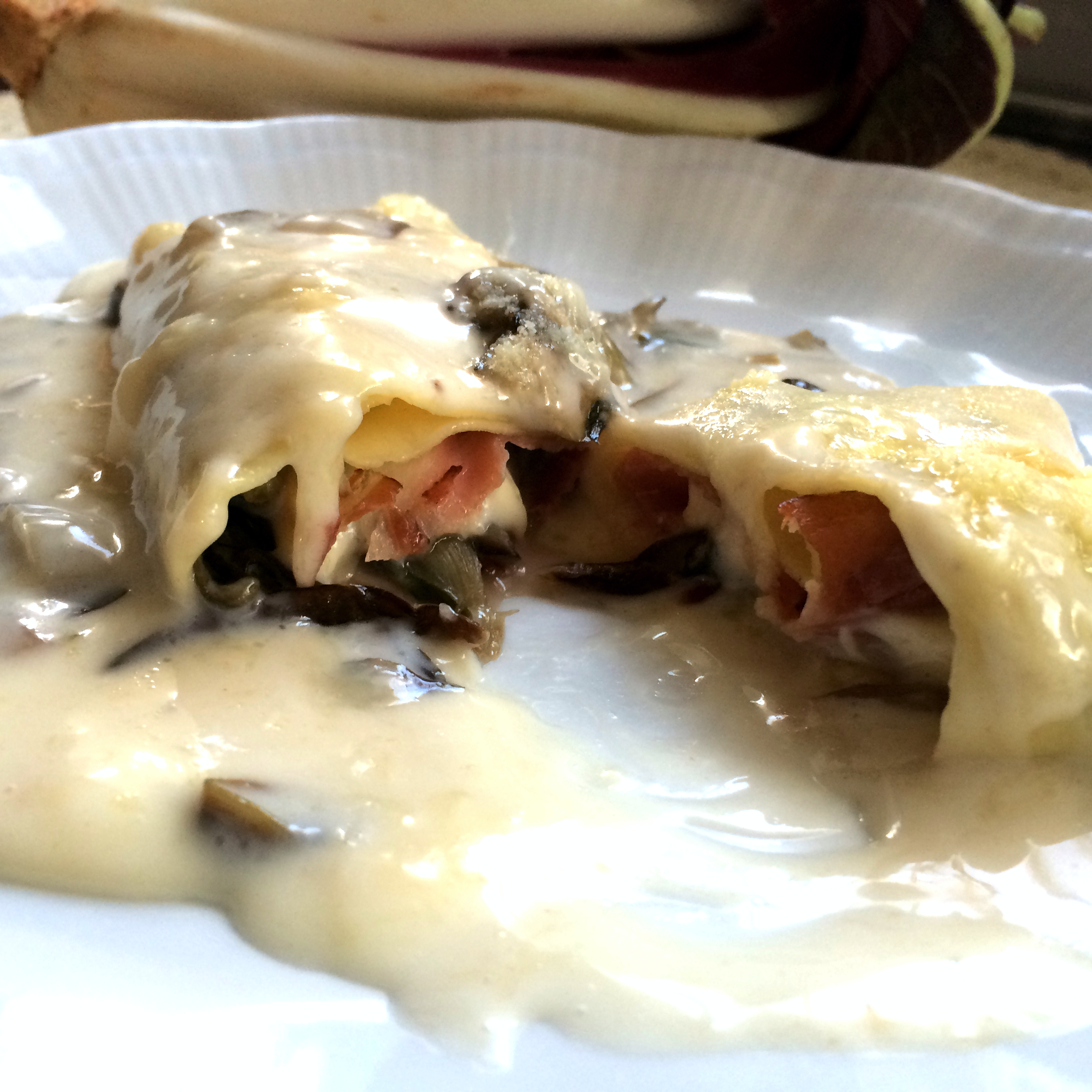 Rotoli di lasagna con radicchio e speck