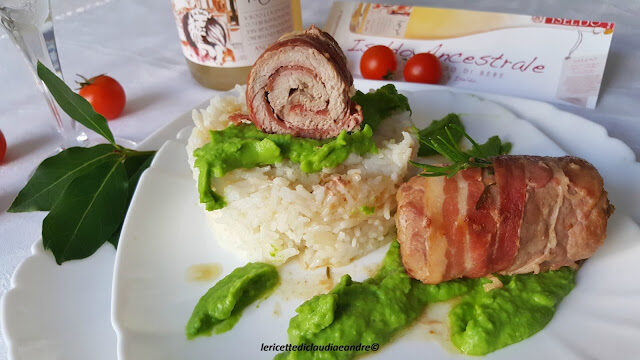 Rotolini di filetto di vitello al ancestrale con fondo iseldo con riso basmati su crema di piselli