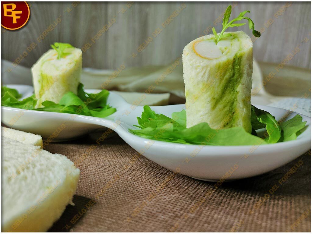 Rotolini di pancarré con crema di rucola e surimi