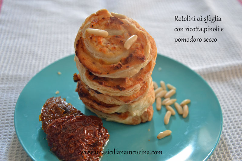 Rotolini di sfoglia con ricotta, pinoli e pomodoro secco