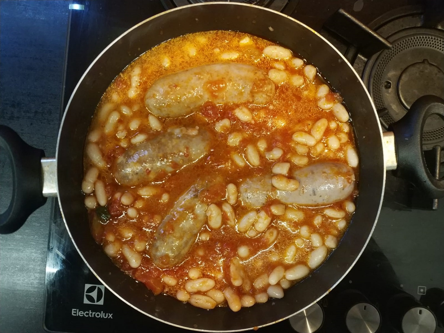 Salsiccia e fagioli all’uccelletto