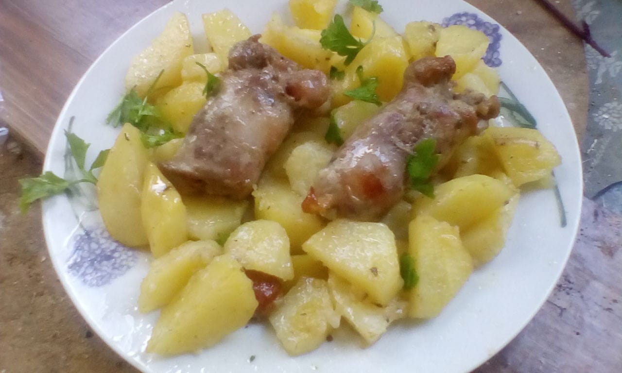 Salsiccia e patate al forno