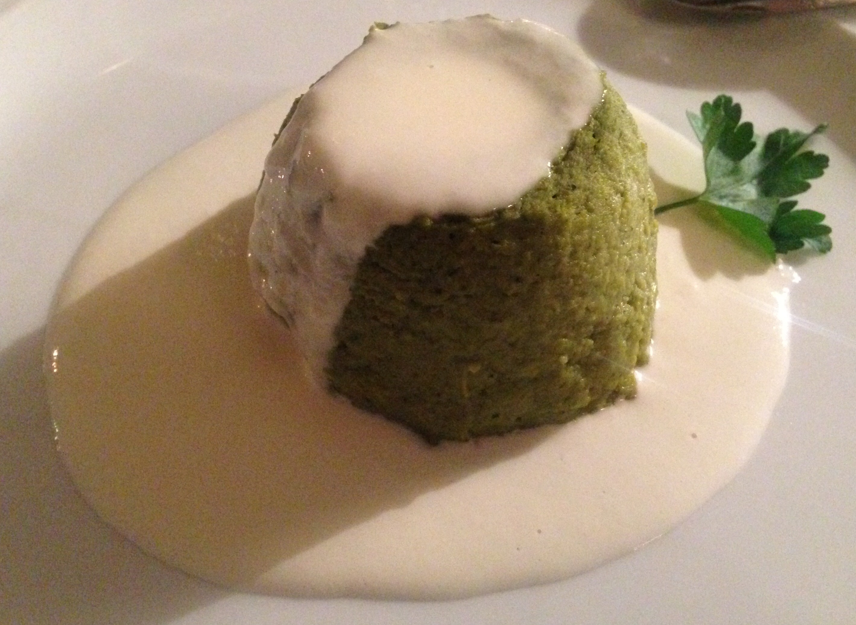 Sformato di broccoli su fonduta di parmigiano