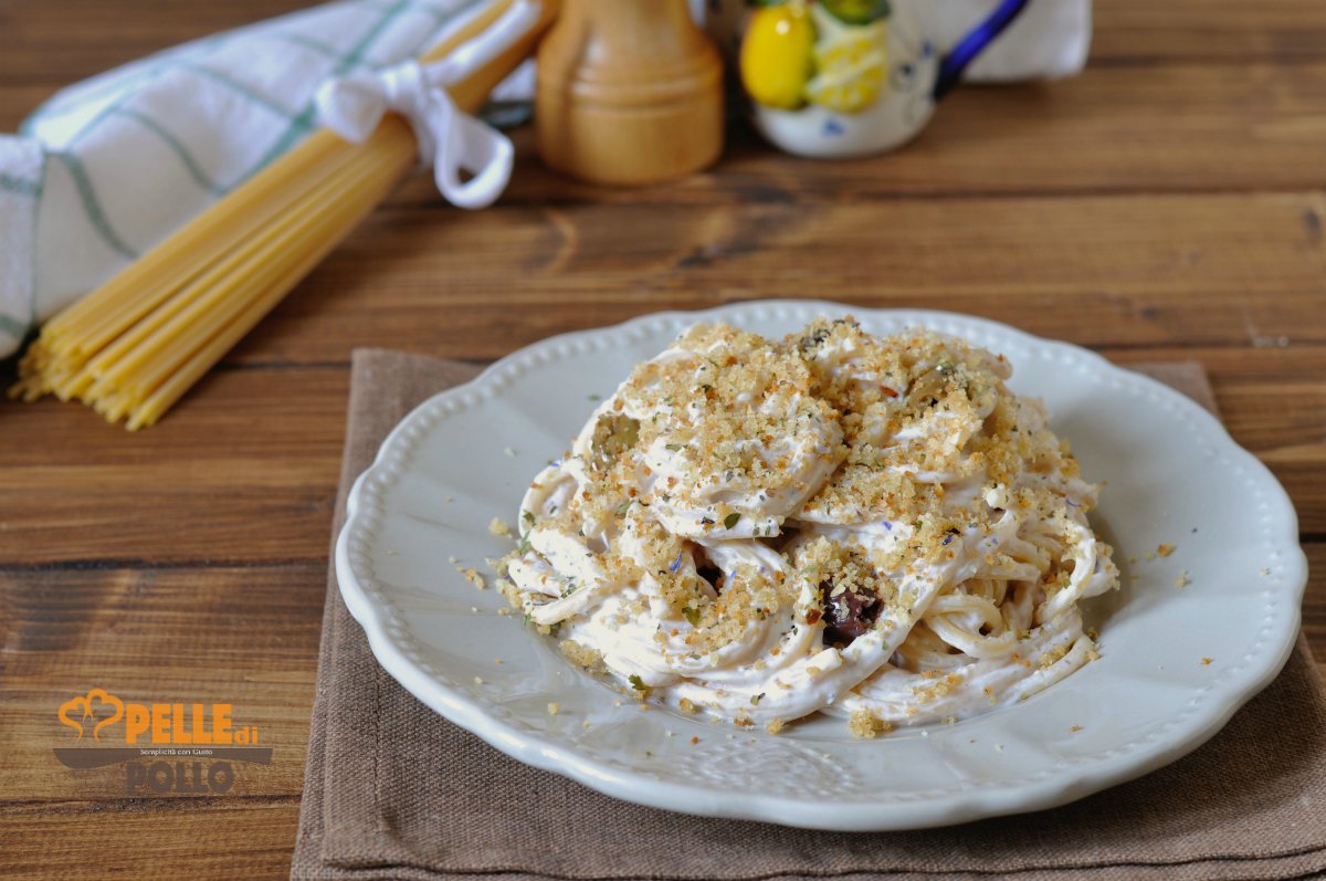 Spaghetti con crema di ricotta e olive