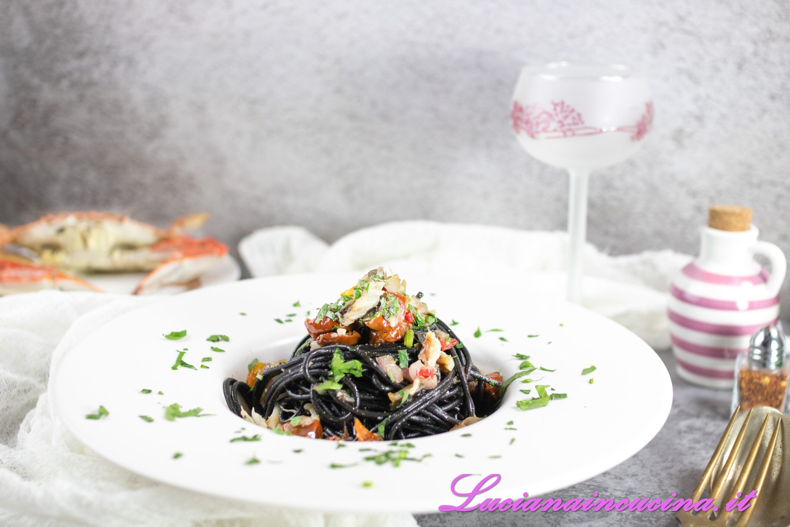 Spaghetti neri al granchio blu