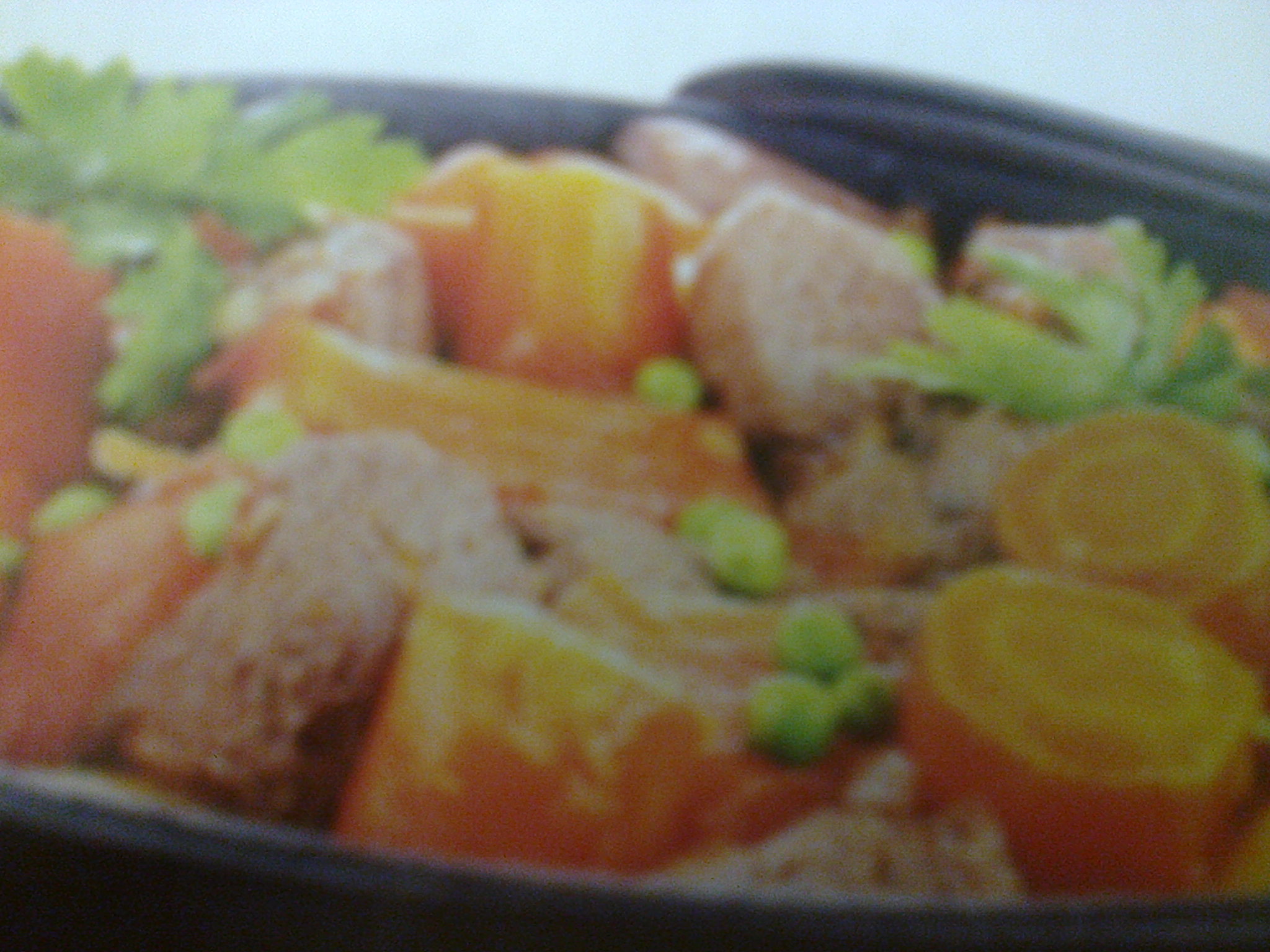 Spezzatino di guanciale con piselli