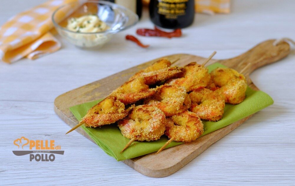 Spiedini di gamberoni gratinati al forno