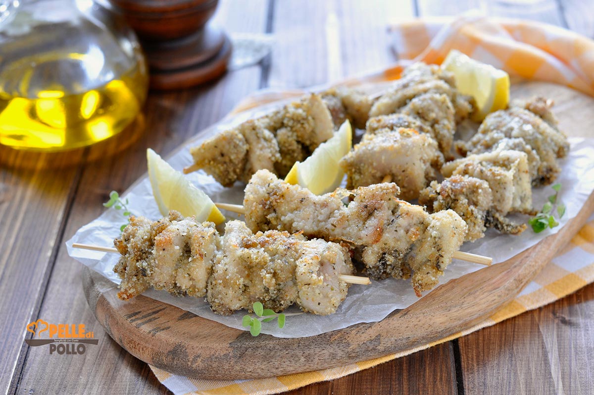 Spiedini di pollo impanati al forno