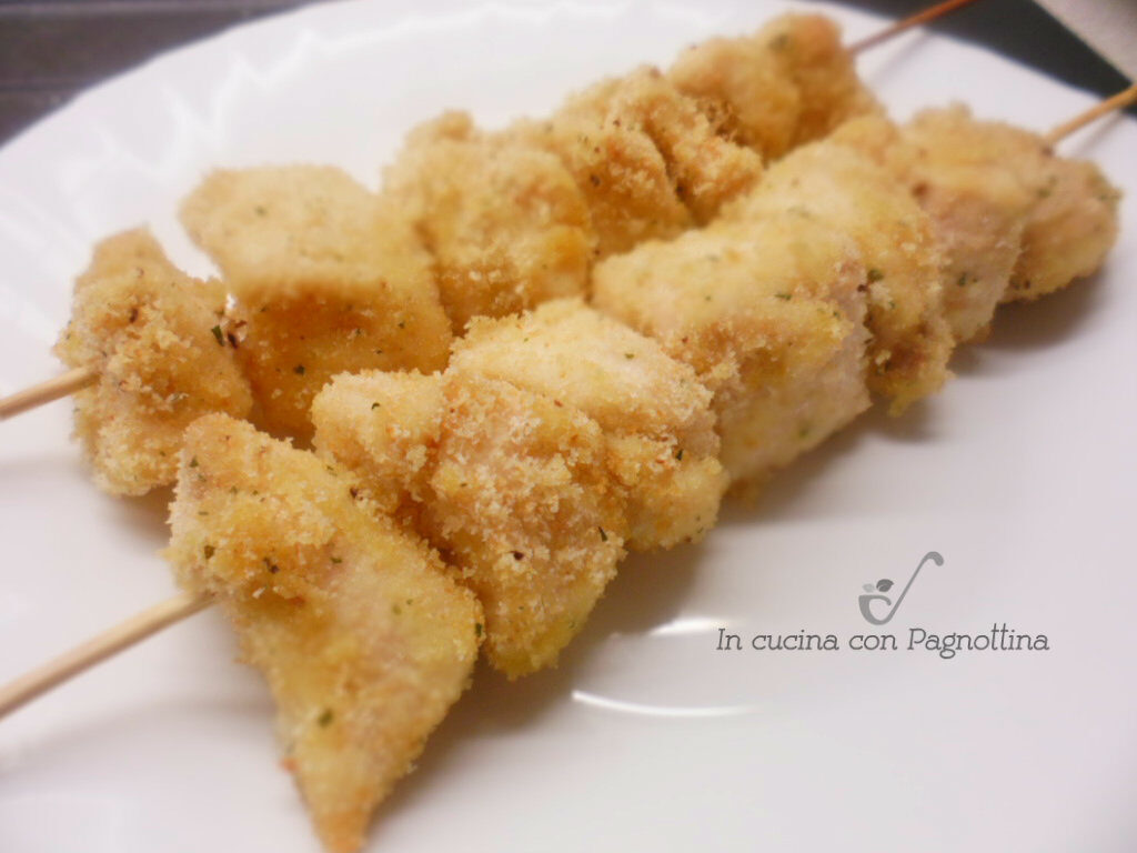 Spiedini di pollo panati al forno