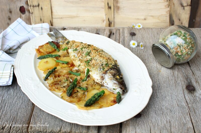 Spigola arrosto con patate e asparagi