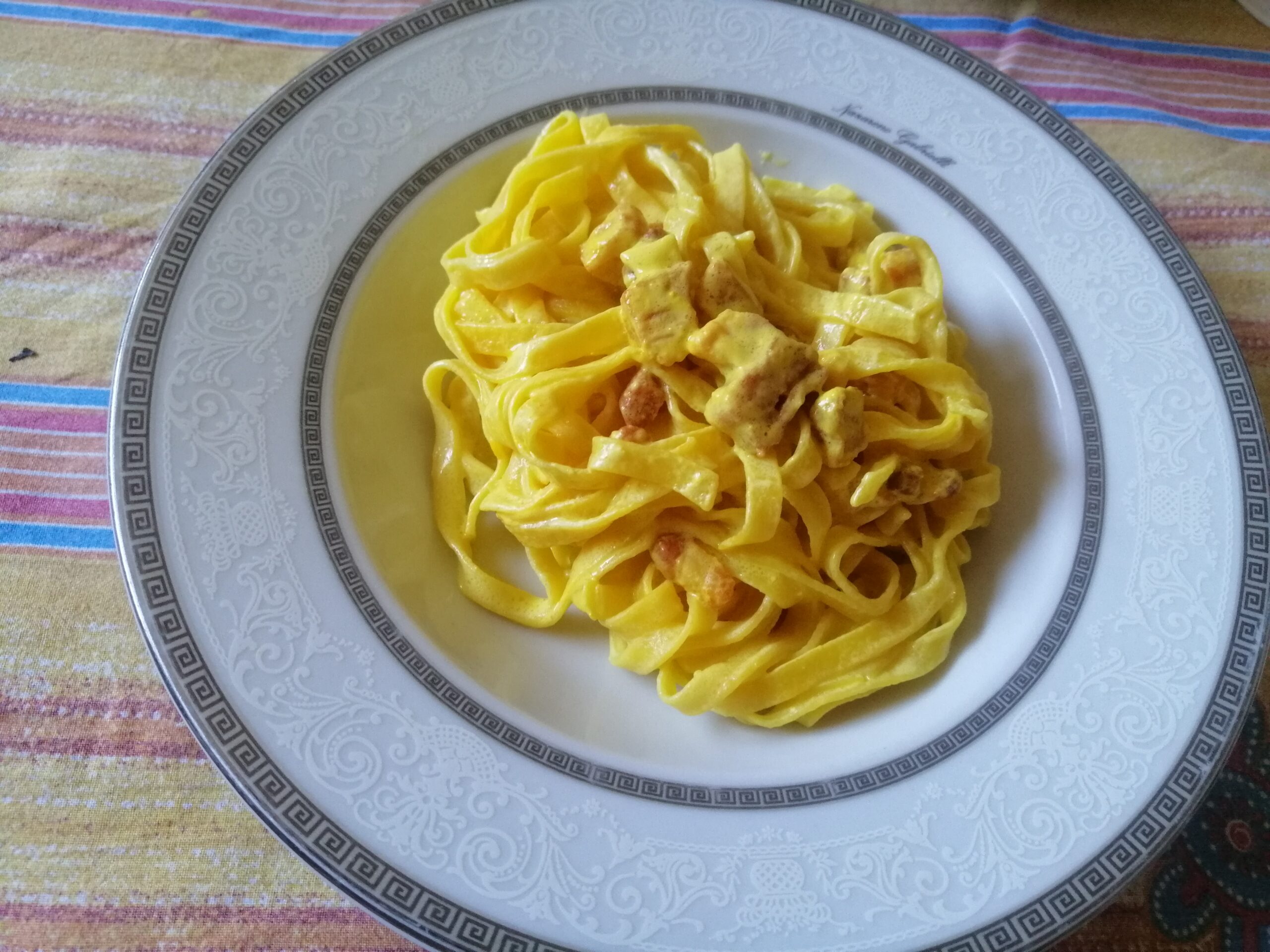 Tagliatelle allo zafferano e pancetta