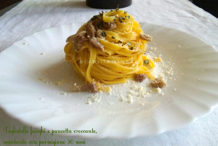 Tagliatelle funghi e pancetta croccante, mantecate con parmigiano 30 mesi