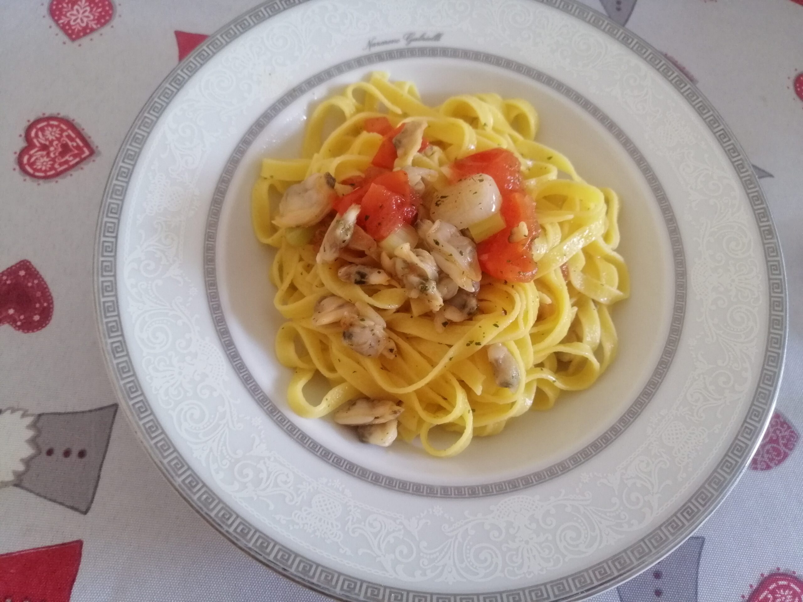Tagliolini risottati alle vongole e datterini