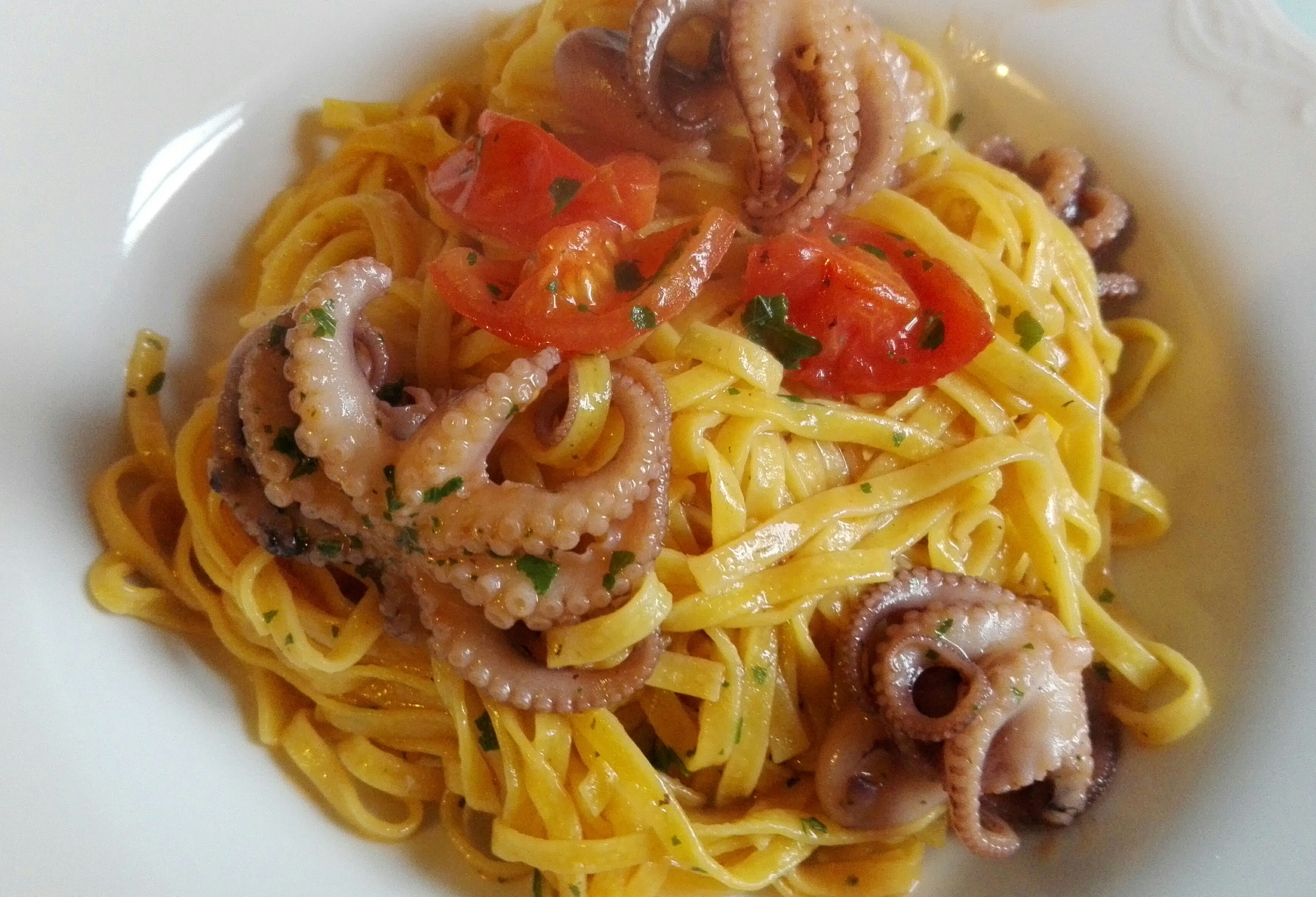 Tagliolini risottati con polpo e pomodorini