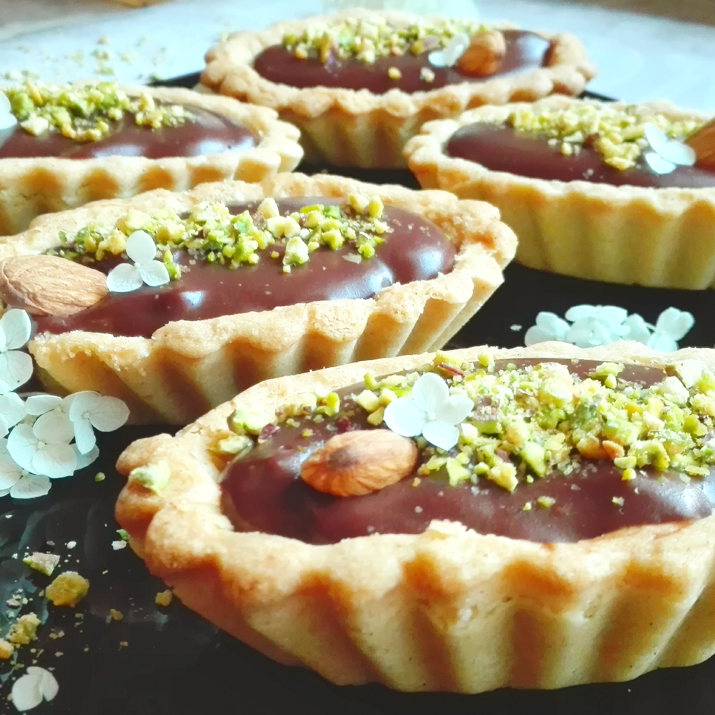 Tartellette al cioccolato e pistacchi
