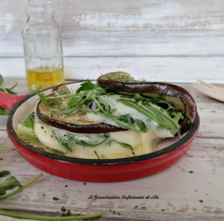 Tasche di melanzane con scamorza e rughetta